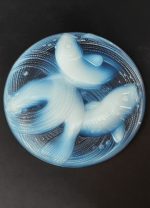 Opaliscent Dish. The outer surface in relief