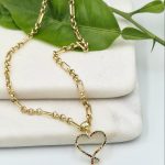 Gold-plated chain and heart with zircons.