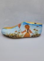 Old wooden shoe last, hand painted