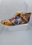 Old wooden shoe last, hand painted
